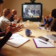 Paramount Pictures executives screen preview footage of the upcoming L.A. earthquake.
